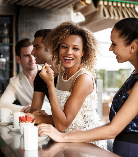 smiling woman at a restaurant