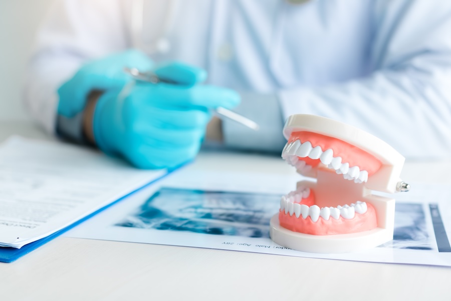 signs you need oral surgery, consult with dentist
